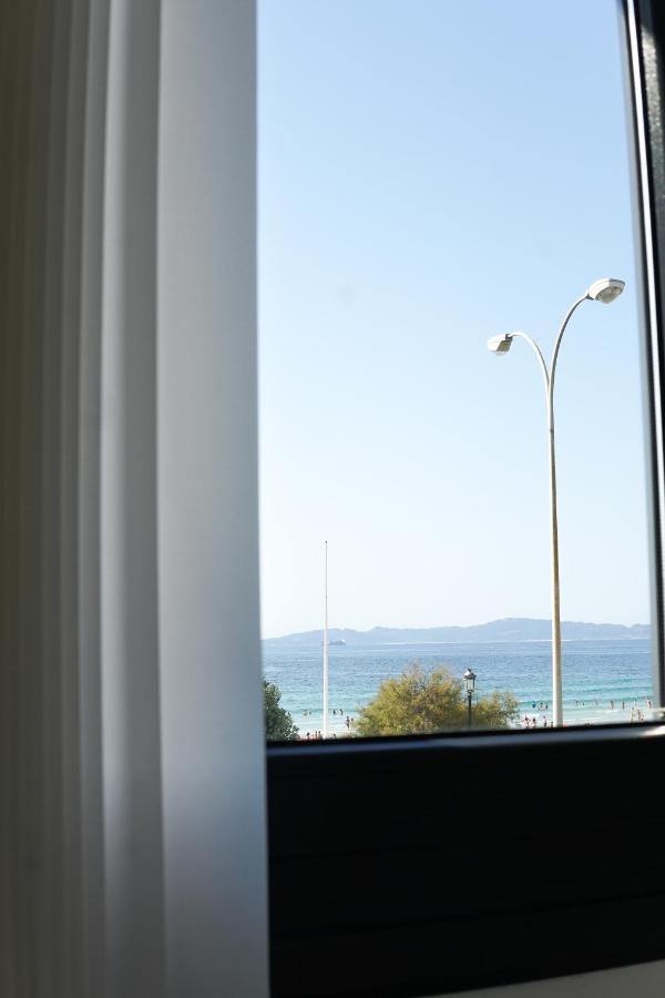 Hostal Montevideo Beachfront Nigran Bagian luar foto
